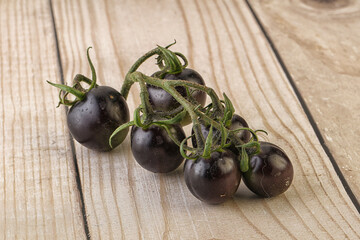 Ripe tasty black cherry tomato