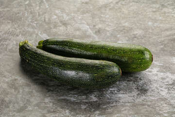 Raw young small green zucchini