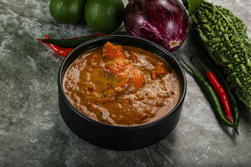 Indian cuisine - chicken curry with spices