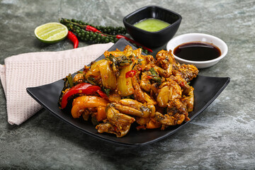 Vietnamese cuisine - fried frog with vegetables