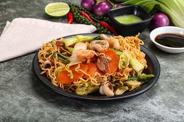 Asian cuisine - Fried noodles with seafood