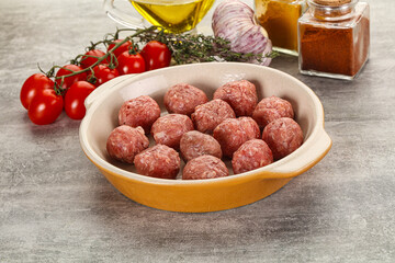 Uncooked raw beef meatball minced