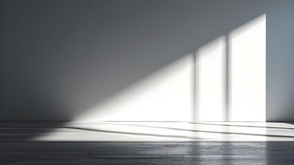 A minimalist interior with light from the window illuminating the interior of the room.