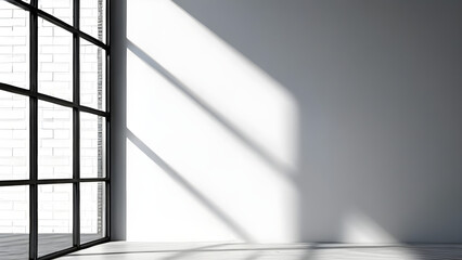 A minimalist interior with light from the window illuminating the interior of the room.