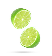 Slice of fresh lime fruit falling in the air isolated on white background.