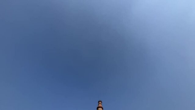 The Qutub Minar at Delhi India.Tallest minaret in the world closeup with selective focus and blur