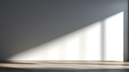 A minimalist interior with light from the window illuminating the interior of the room.