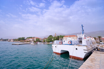 Boats moored on Kastel coast in Dalmatia,Croatia. Old town near Adriatic sea.