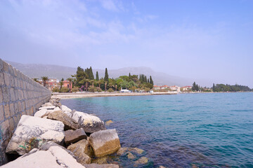Pier on Kastel coast in Dalmatia,Croatia. Old town near Adriatic sea.