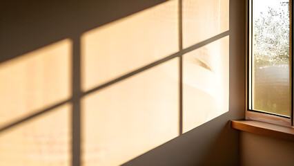 A minimalist interior with light from the window illuminating the interior of the room.