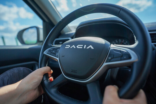 Dacia steering wheel. Dacia logo. photo taken in January 2022 in Bucharest, Romania. 4k video.