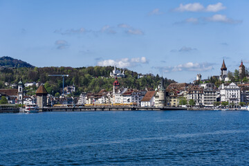 Scenic view of Swiss City of Lucerne seen from passenger ship on Lake Lucerne on a sunny spring...