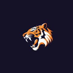 Stylized tiger head graphic design dark background. Orange white tiger face sport logo illustration. Roaring mascot esports team symbol