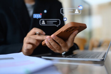 Women using a smart phone with notification icons. Concept communication and technology