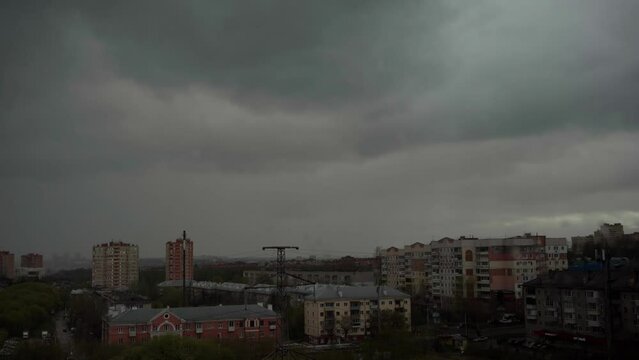 The beginning of rain in the city.