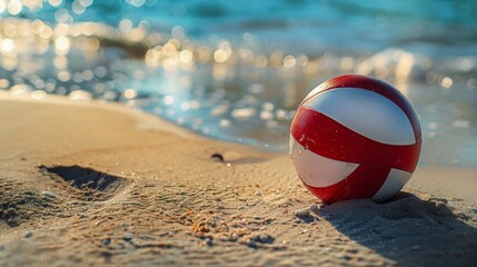 Obraz premium A Close-Up Portrait of a White Red Beach Volleyball Positioned on the Sandy Shoreline, Embracing the Joy and Vitality of Beachside Recreation