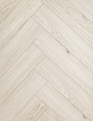 Laminate of light beige color with delicate shades of gray, imitating the texture of natural wood.