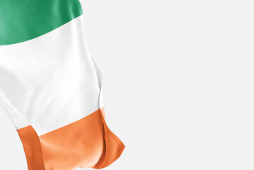 National flag of Ireland flutters in the wind. Wavy Ireland Flag. Close-up front view.