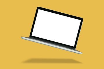 Laptop with blank screen isolated on yellow background