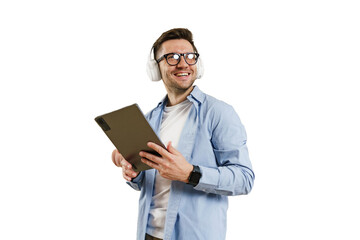 Portrait of a man with glasses and headphones education online uses a tablet, cut out background