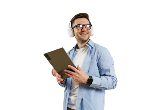 Portrait of a man with glasses and headphones education online uses a tablet, cut out background