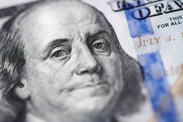 Benjamin Franklin close up face from us hundred dollar bill. United States national currency...