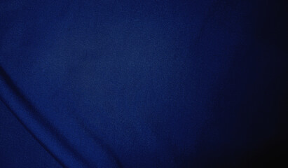 Dark blue velvet fabric background in a luxurious style for graphic design