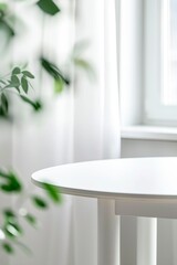  White round table in front of white curtains and green plants. A closeup of the tabletop,  bright light from the window and a blurred background.  minimalist style,  design, copy space for text