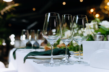 Empty glasses set in restaurant. the glasses are on the table. table setting for a banquet