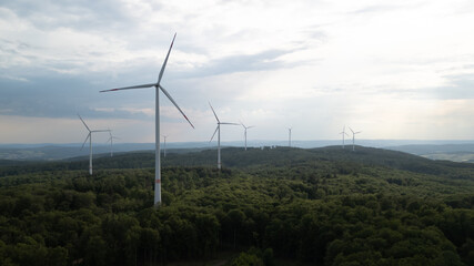 Aerial view of the wind turbines in the countryside on a gloomy day