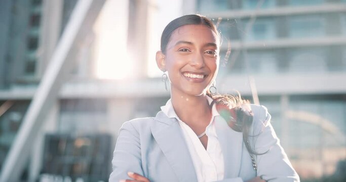 Portrait, Indian woman and happy with confidence outdoor on career or job opportunity and growth as accountant. Female employee, smile and satisfied in New York downtown with pride and arms crossed