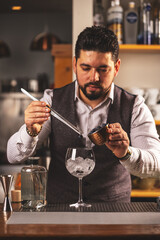 Professional bartender preparing a cocktail