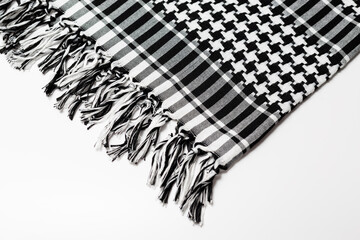 A traditional pattern head-tied garment 'Keffiyeh' or 'Puşi' on a white isolated background....