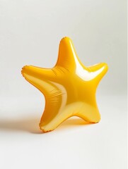 inflatable ball in the shape of a star in gold color isolated on a white background