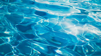 blue water surface of pool with light reflections texture