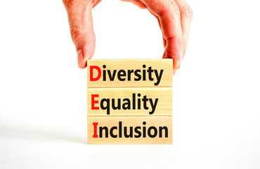 DEI diversity equality inclusion symbol. Concept words DEI diversity equality inclusion on blocks....