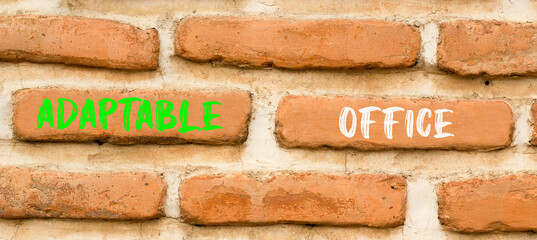 Adaptable office symbol. Concept words Adaptable office on beautiful brick wall. Beautiful red...