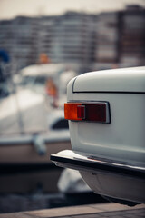 Old and classic car rear taillight close up