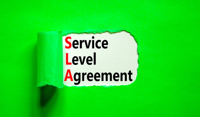 SLA service level agreement symbol. Concept words SLA service level agreement on beautiful white...