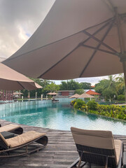 gazebo and pathways at beach against blue sky. Nusa dua, Bali.