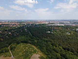 Aerial landscape of Grunewald forest and city skyline on a sunny day in Berlin