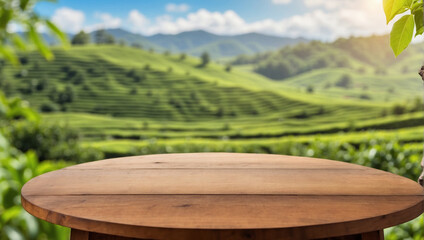 Circle wooden table top with blurred tea plantation landscape against blue sky and blurred green leaf frame for product display - Powered by Adobe