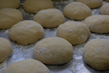 The process of making dough for sweet bread at home. Making buns with flour. The concept of baking bread