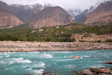 Nagar river and beautiful mountains landscape in Nagar, Gilgit Baltistan, Pakistan. 