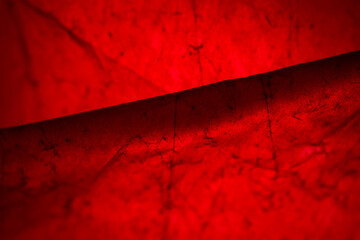 Extreme close up of red empty plastic bag background.
