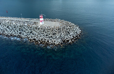 Lighthouse on a rock breakwater