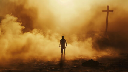 Fototapeta premium Silhouette of a man in the desert with a cross in the smoke and dust under light the sun, religion concept. 