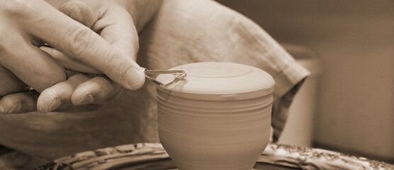 Artisan Potter Trimming Clay Pot On Spinning Wheel Sepia Tone