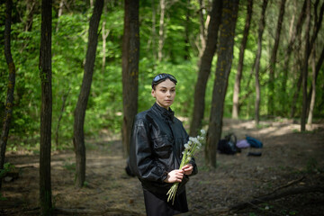 Girl Walking Through Forest Holding Dandelions