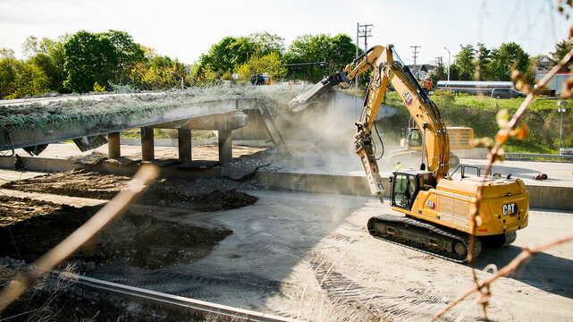 NORWALK, CT, USA- MAY 4, 2024: Cleaning I 95 and demolishing bridge  after a tractor-trailer fire in Norwalk between Exit 14 and 15